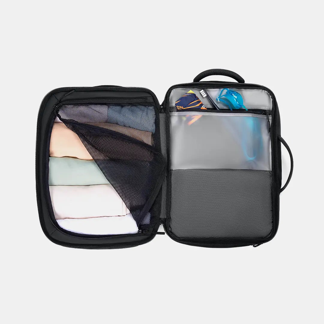 180-degree clamshell opening of the travel backpack for packing clothes, featuring a waterproof and odor-proof bag alongside modular functionality.