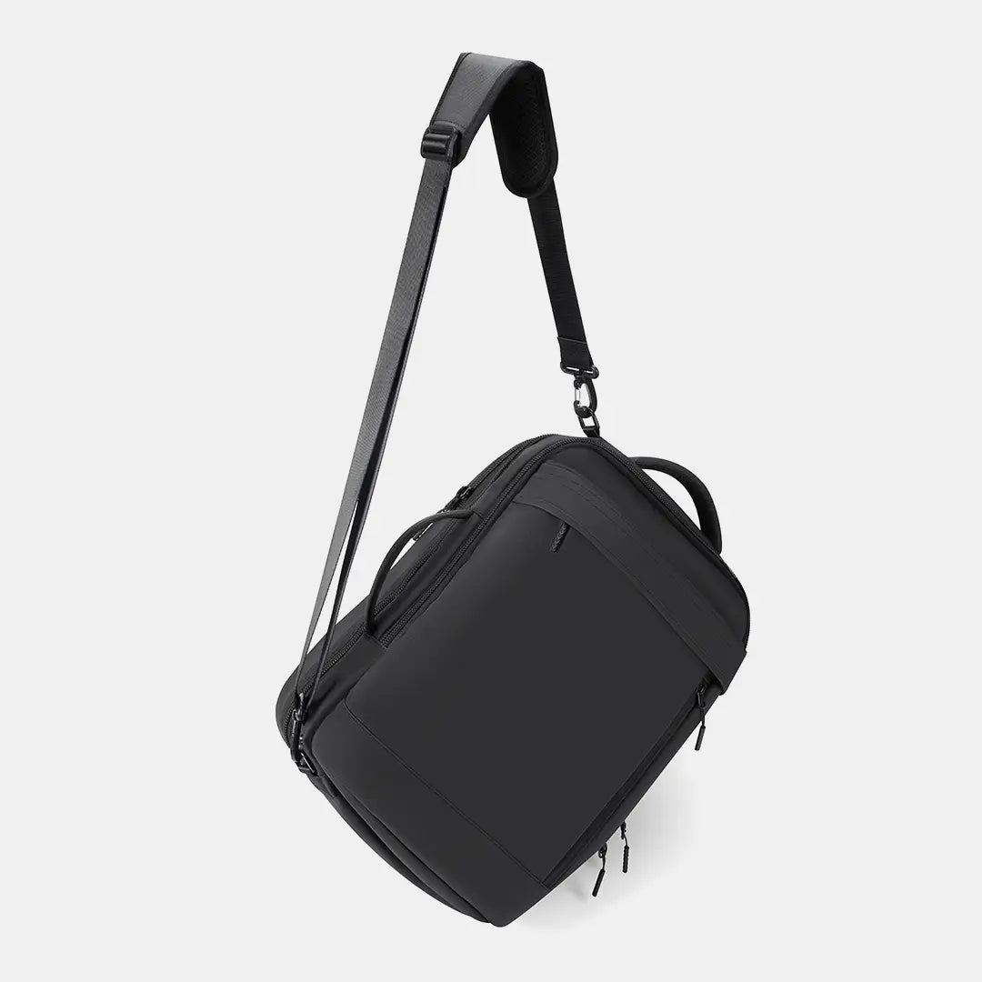 Travel Expandable Backpack Pro converted into a professional single-shoulder briefcase mode using the included premium shoulder strap.