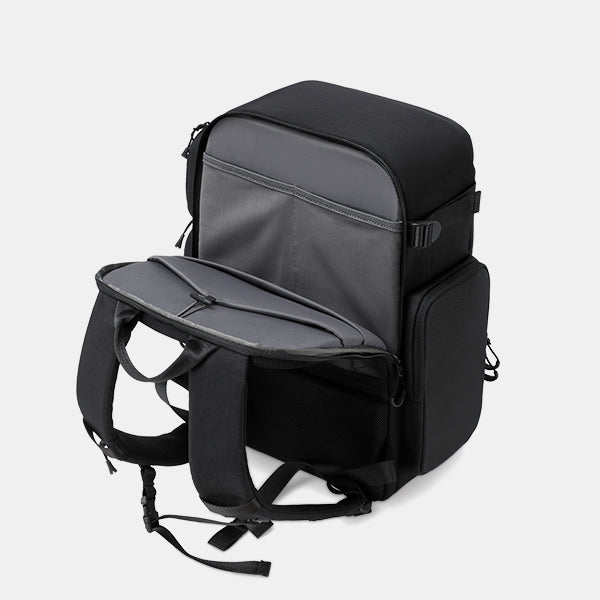 Black and gray backpack on a light gray background
