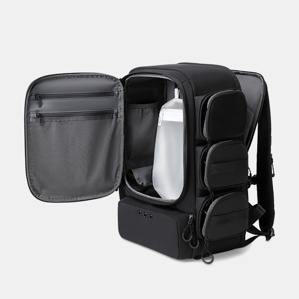 Black backpack with open front compartment showing a water bottle on a light gray background