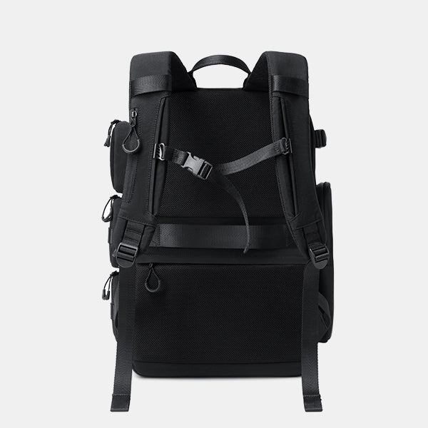 Black backpack on a light gray background