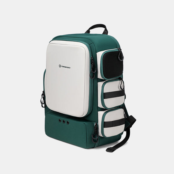 Green and white backpack with visible brand logo on a light gray background#color_dark-teal