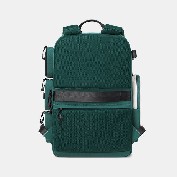 Green backpack on a light gray background#color_dark-teal