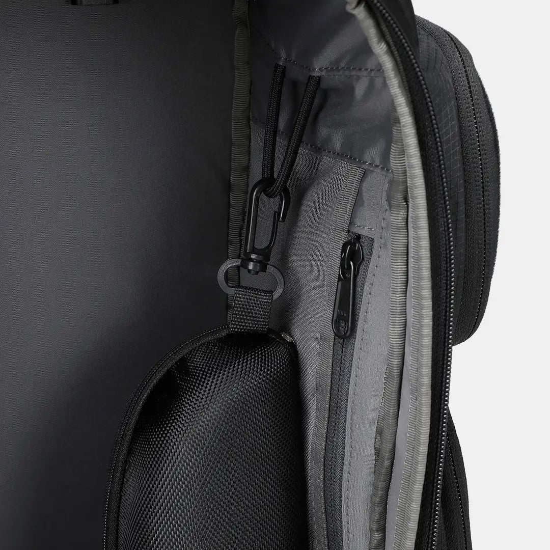 Gym backpack zipper, side pocket and quick-release buckle close-up