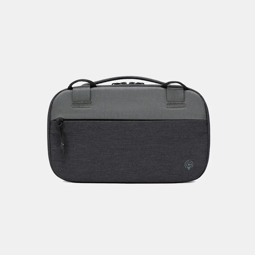 Flat-lay view of closed black Cinomadist tech pouch