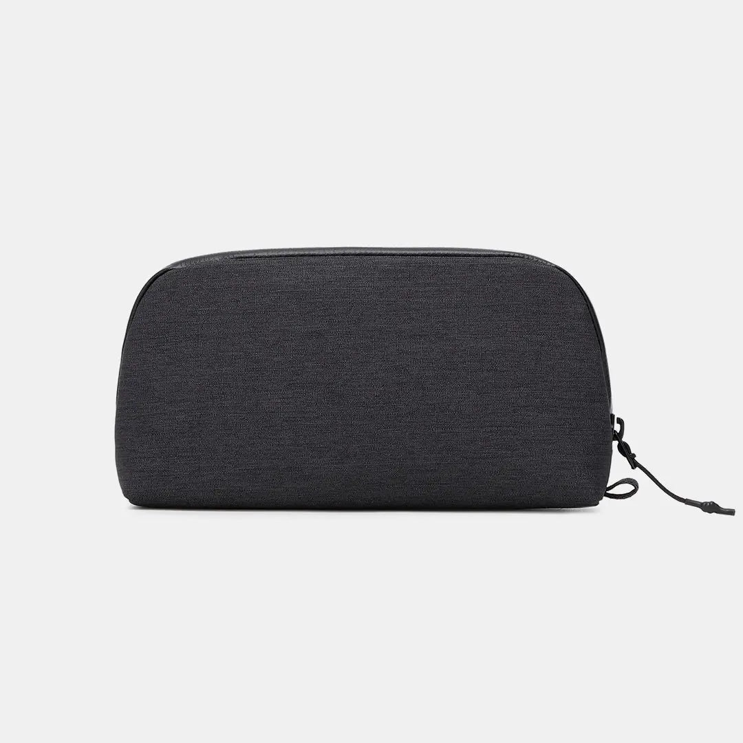 Side profile of the Cinomadist Slim Tech Pouch in black