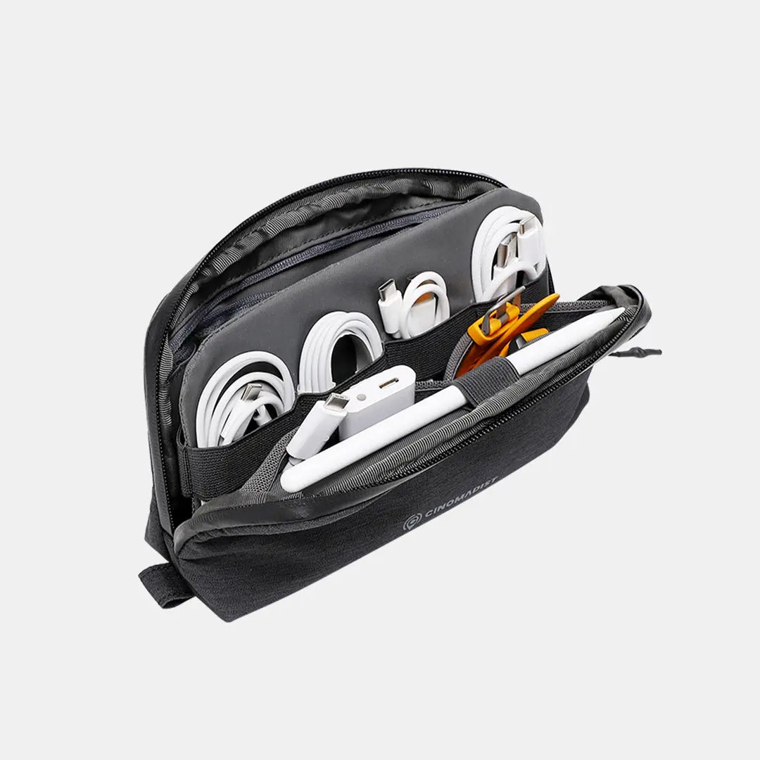 Top-down view of open Cinomadist pouch showing internal organization#color_black