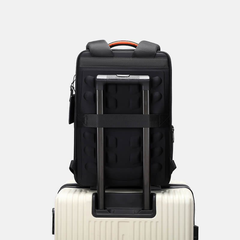 Black suitcase with a white base on a light gray background