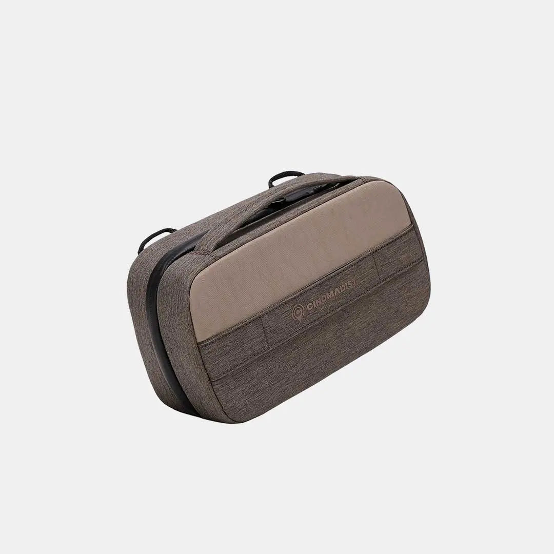 Angled shot of brown Cinomadist pouch showing zipper and stitching