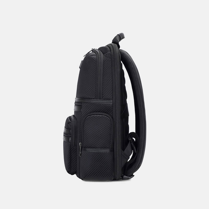 Black backpack on a light gray background