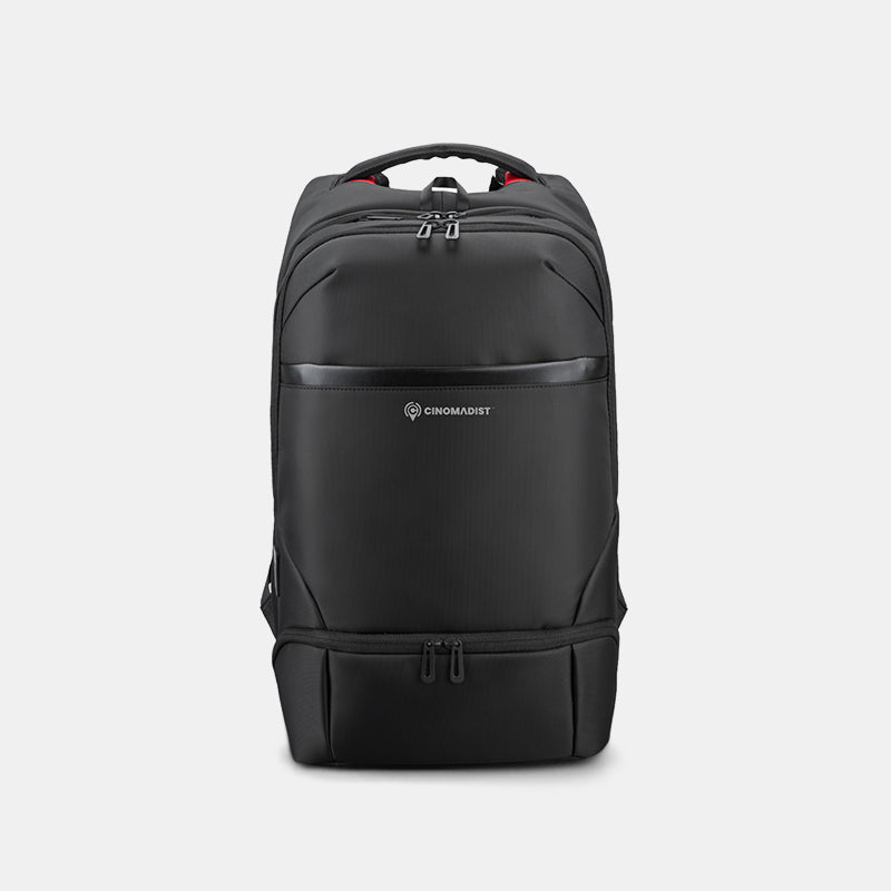 Black backpack with Cinemagist logo on a light gray background