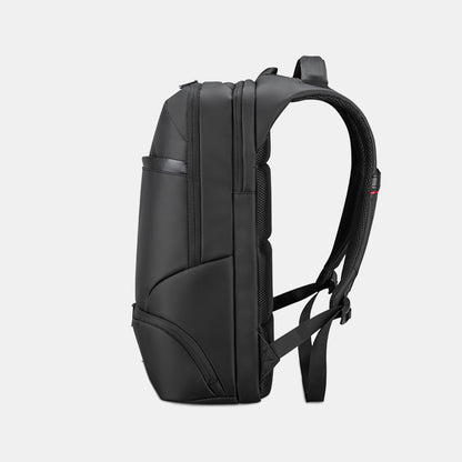 Black backpack on a light gray background