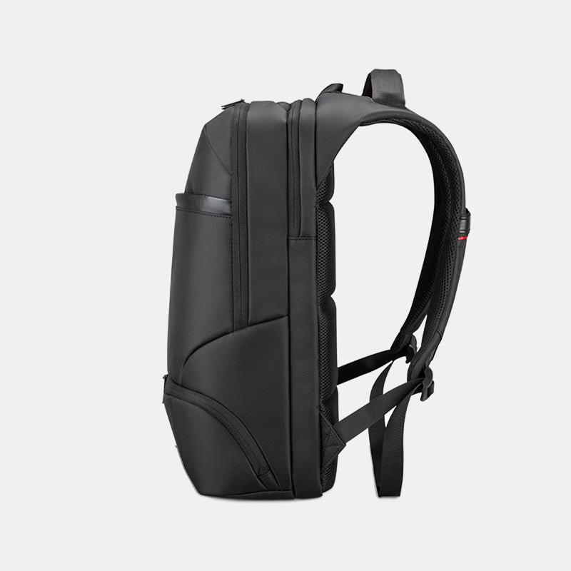 Black backpack on a light gray background