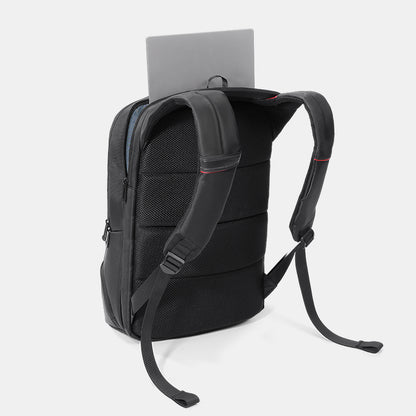 Black backpack with a gray tablet on a white background