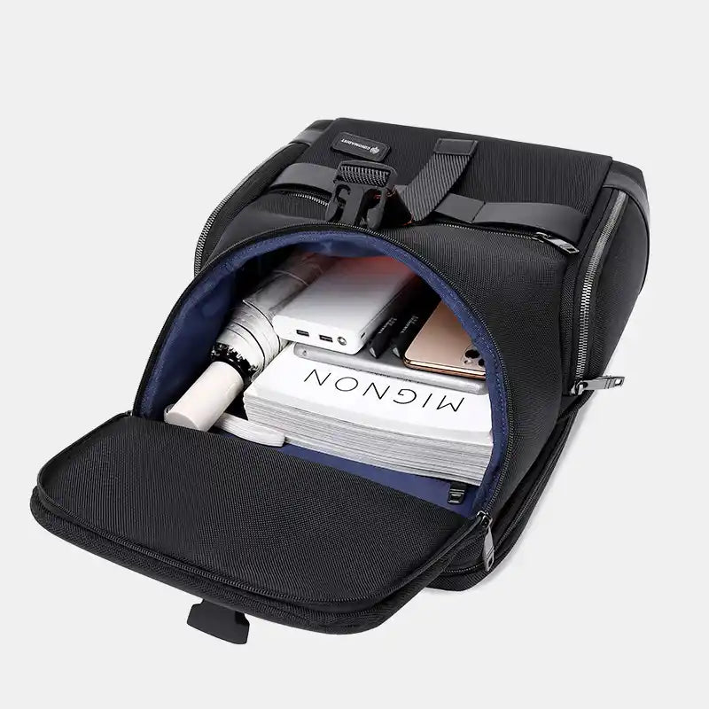 Black backpack with compartments containing a notebook, phone, and other items on a light gray background