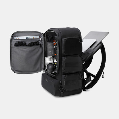 Black backpack with open compartments on a light gray background#color_black