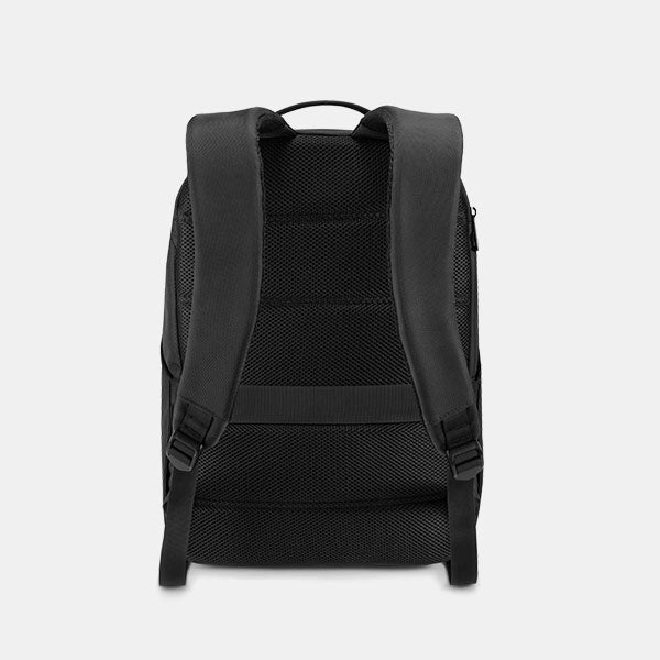 Black backpack on a light gray background