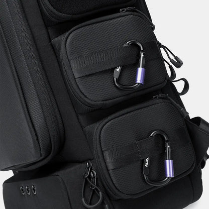 Black gym backpack front molle pockets with carabiner clips close-up