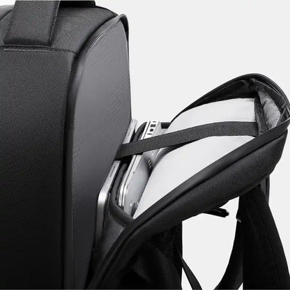 Black backpack with a laptop compartment on a white background