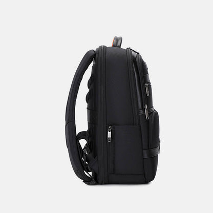 Black backpack on a light gray background