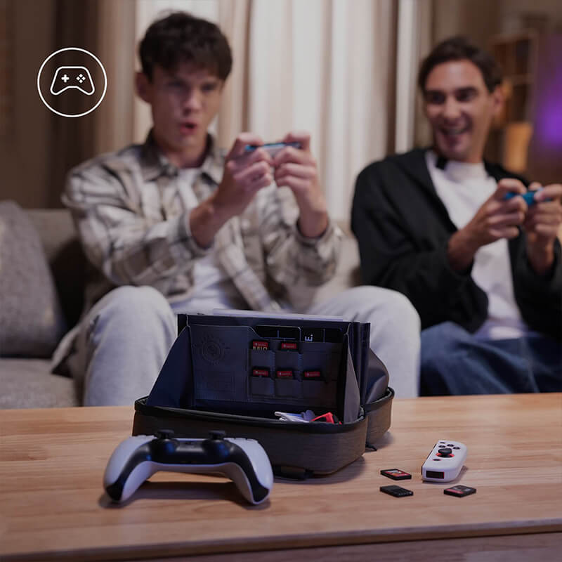 Organized tech pouch holding game cards during a gaming session