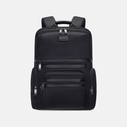 Black backpack with zippers on a light gray background