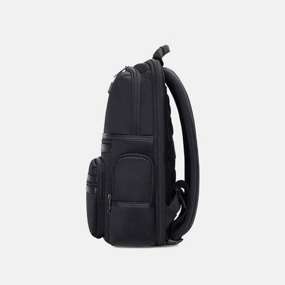 Black backpack on a light gray background