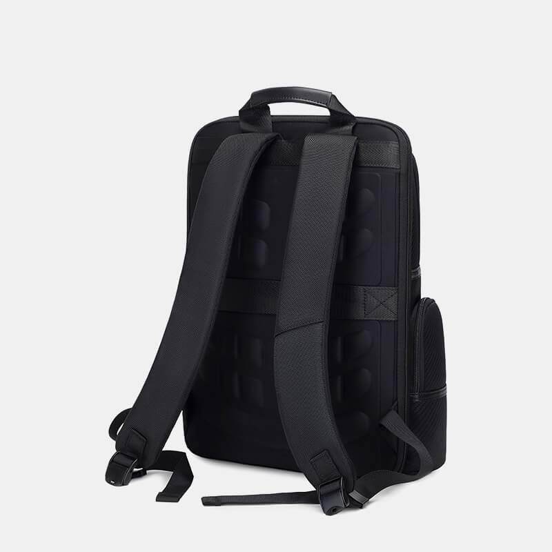 Black backpack on a light gray background