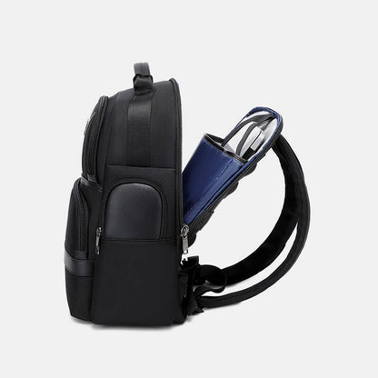 Black backpack with a blue water bottle inside on a light gray background