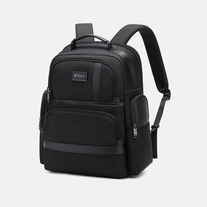 Black backpack with a visible brand logo on a light gray background
