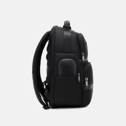 Black backpack on a light gray background