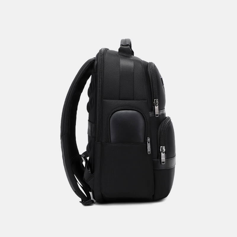 Black backpack on a light gray background