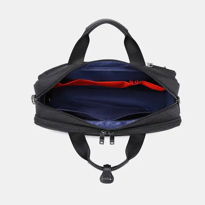 Black laptop bag with open front compartment on a light gray background