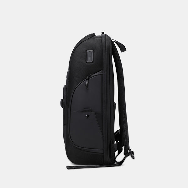 Black backpack on a light gray background