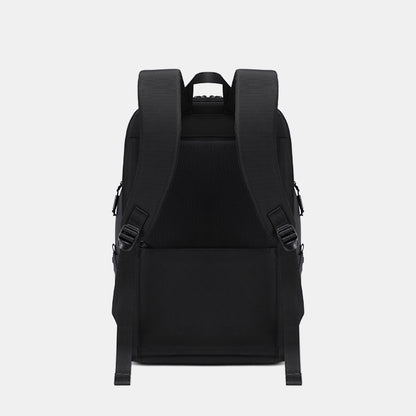 Black backpack on a light gray background
