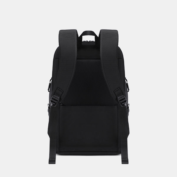 Black backpack on a light gray background