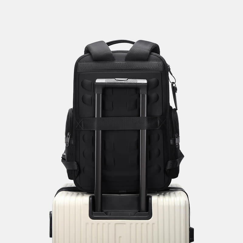 Black backpack with rolling handle on a white background