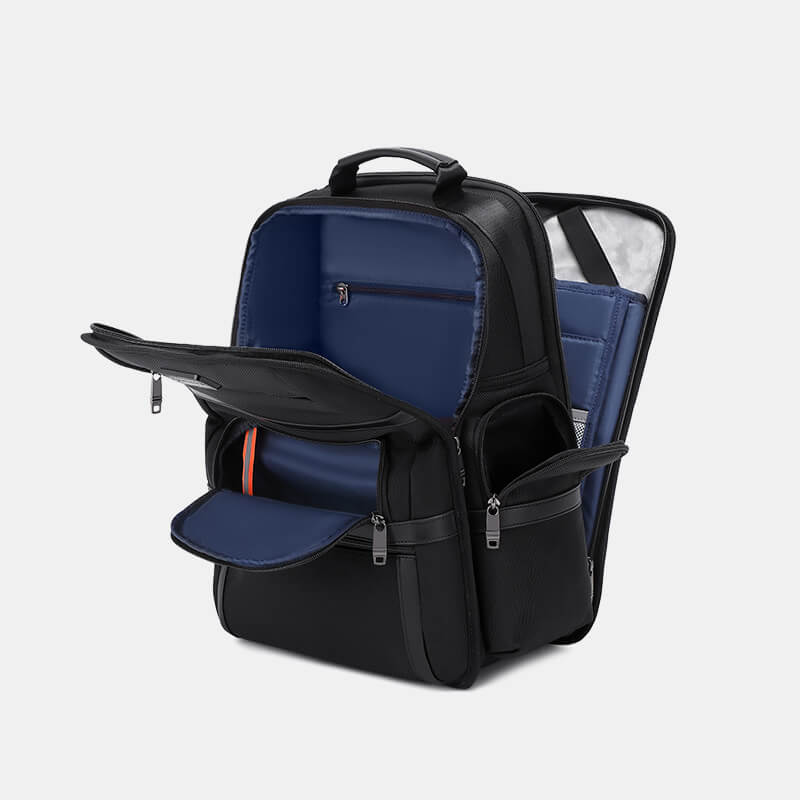 Black and blue backpack with open compartment on a light gray background