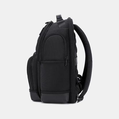 Black backpack on a light gray background