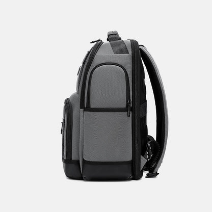 Gray and black backpack on a light gray background